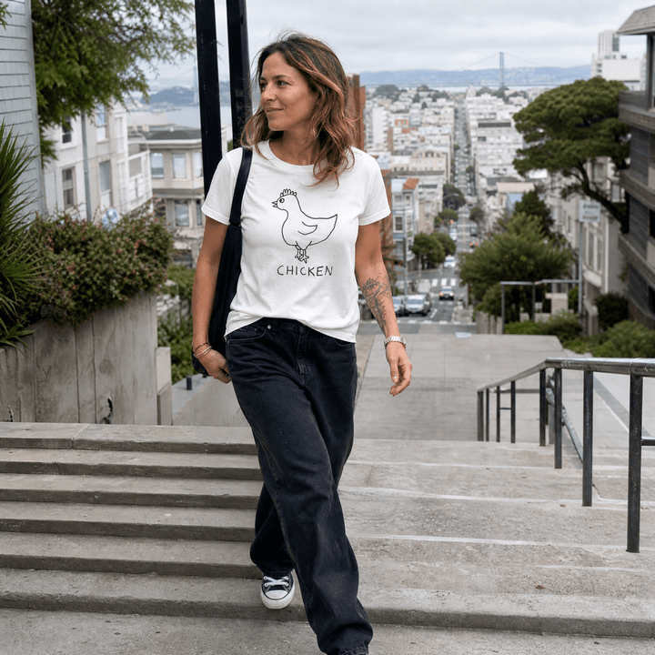 Woman walking down a San Francisco street wearing a lo-fi Chicken V-Neck Tee