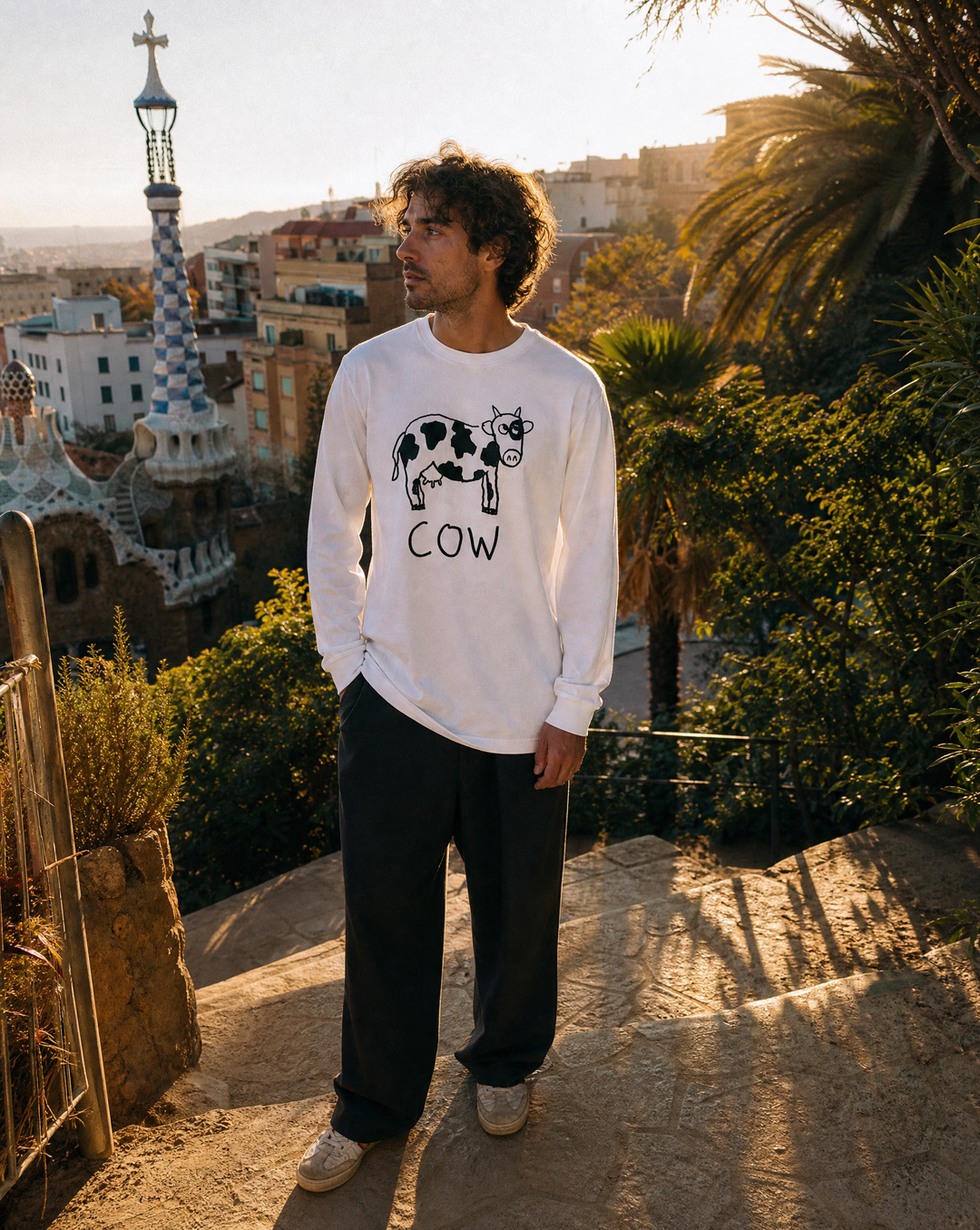 lo-fi Cow Long Sleeve Tee — hand-drawn cow graphic on a white long-sleeve t-shirt