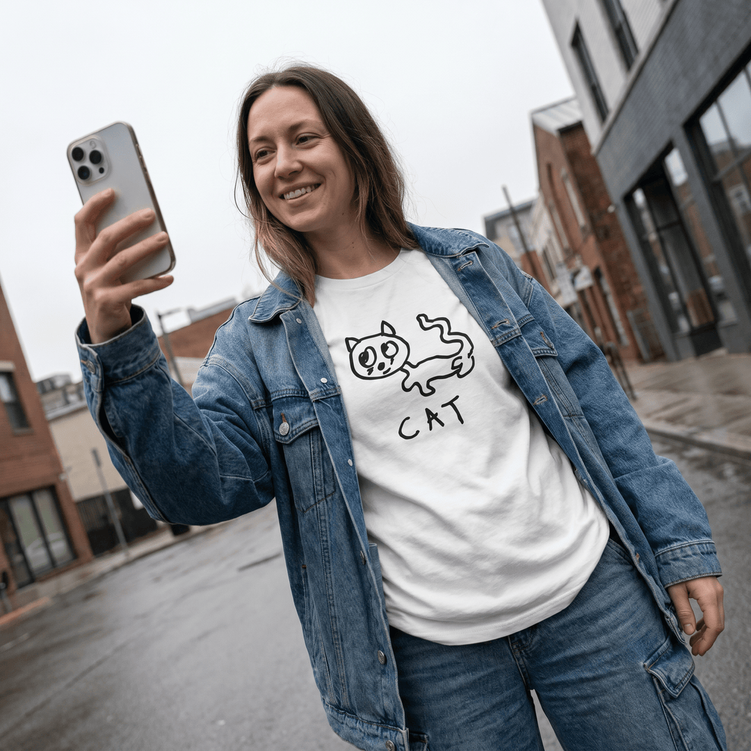 Woman taking a street selfie in a lo-fi Cat Women&
