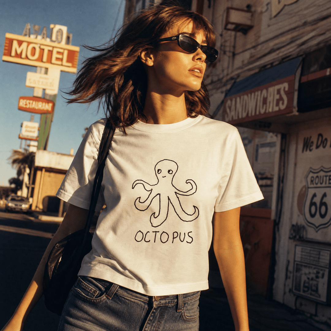 Woman walking a Route 66 street wearing a lo-fi Octopus Women&