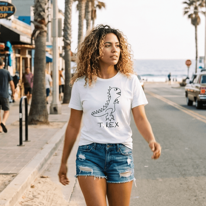 Woman walking a palm-lined beach town street in a lo-fi T. Rex Women&