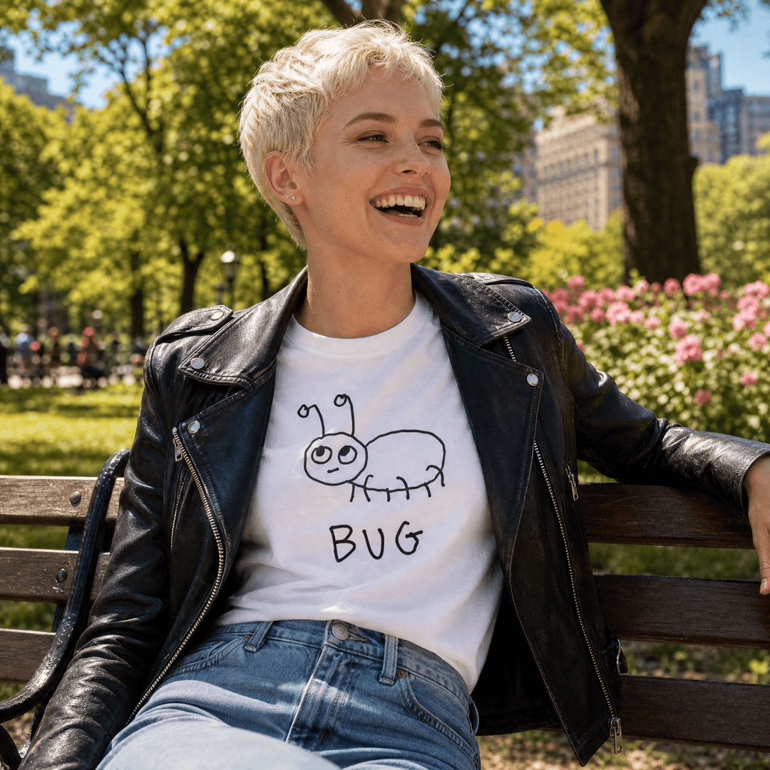 Woman seated on a park bench in a lo-fi Bug Women&