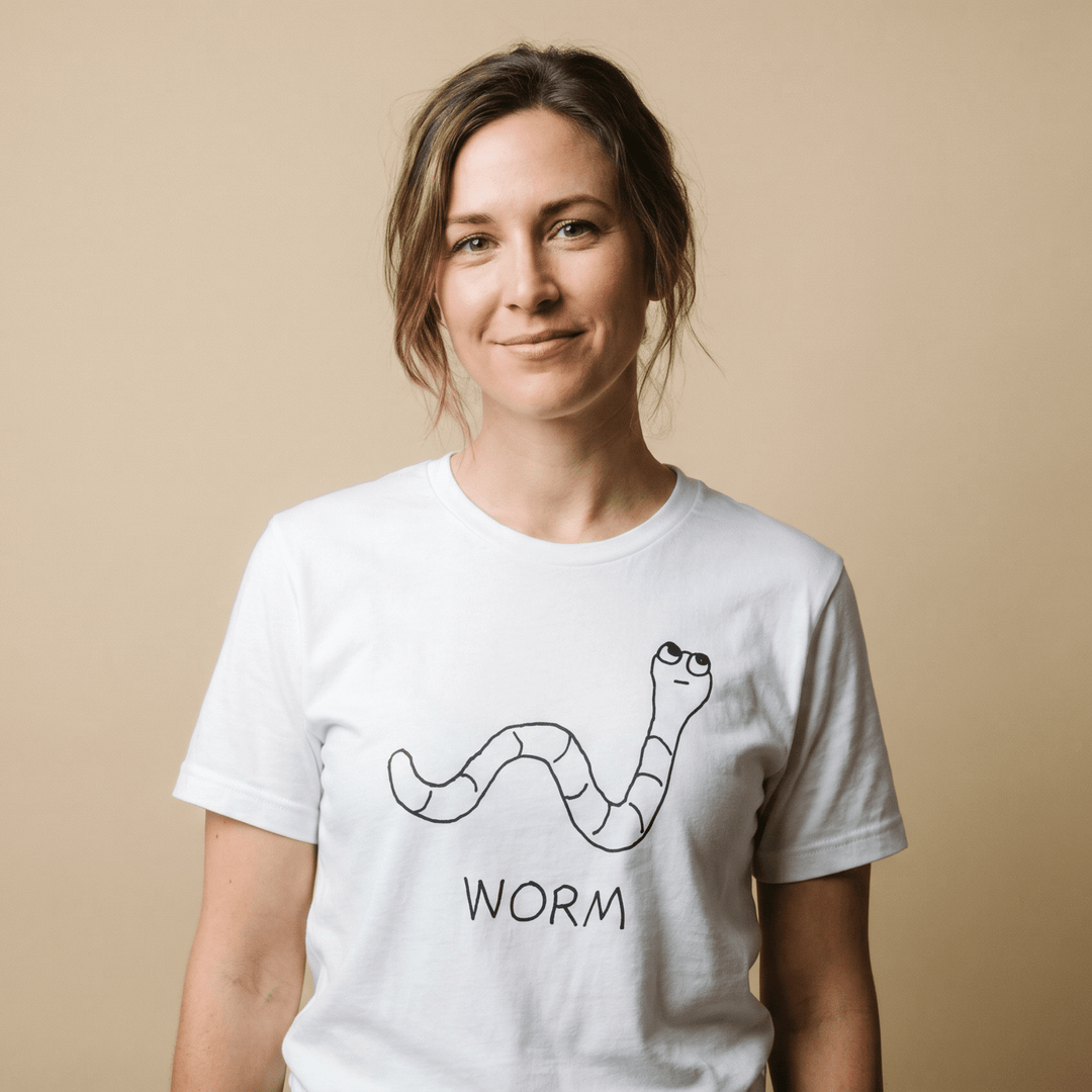 Woman in a studio portrait wearing a lo-fi Worm Women&