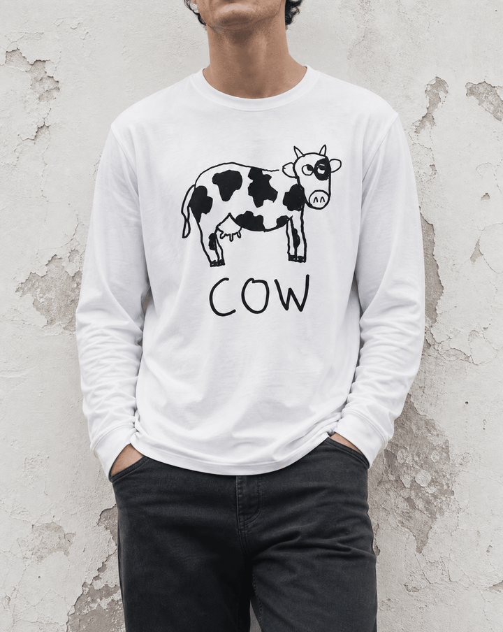 Woman street-style torso shot in a lo-fi Cow Long Sleeve Tee in white