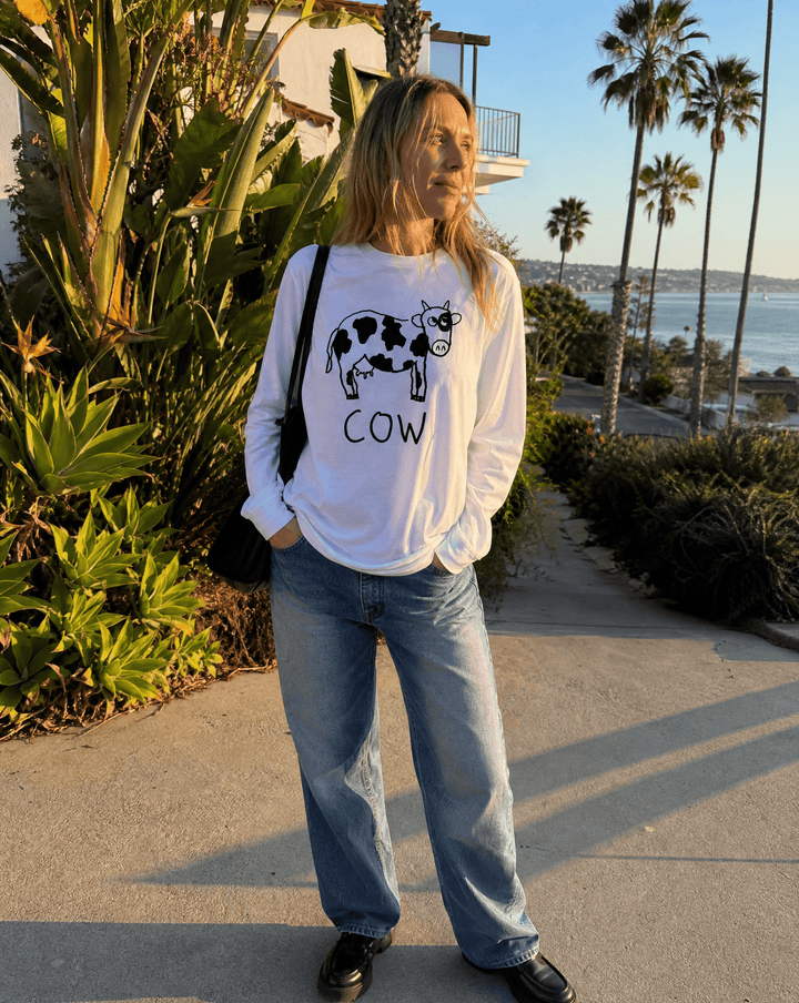 lo-fi Cow Long Sleeve Tee — hand-drawn cow graphic on a white long-sleeve t-shirt
