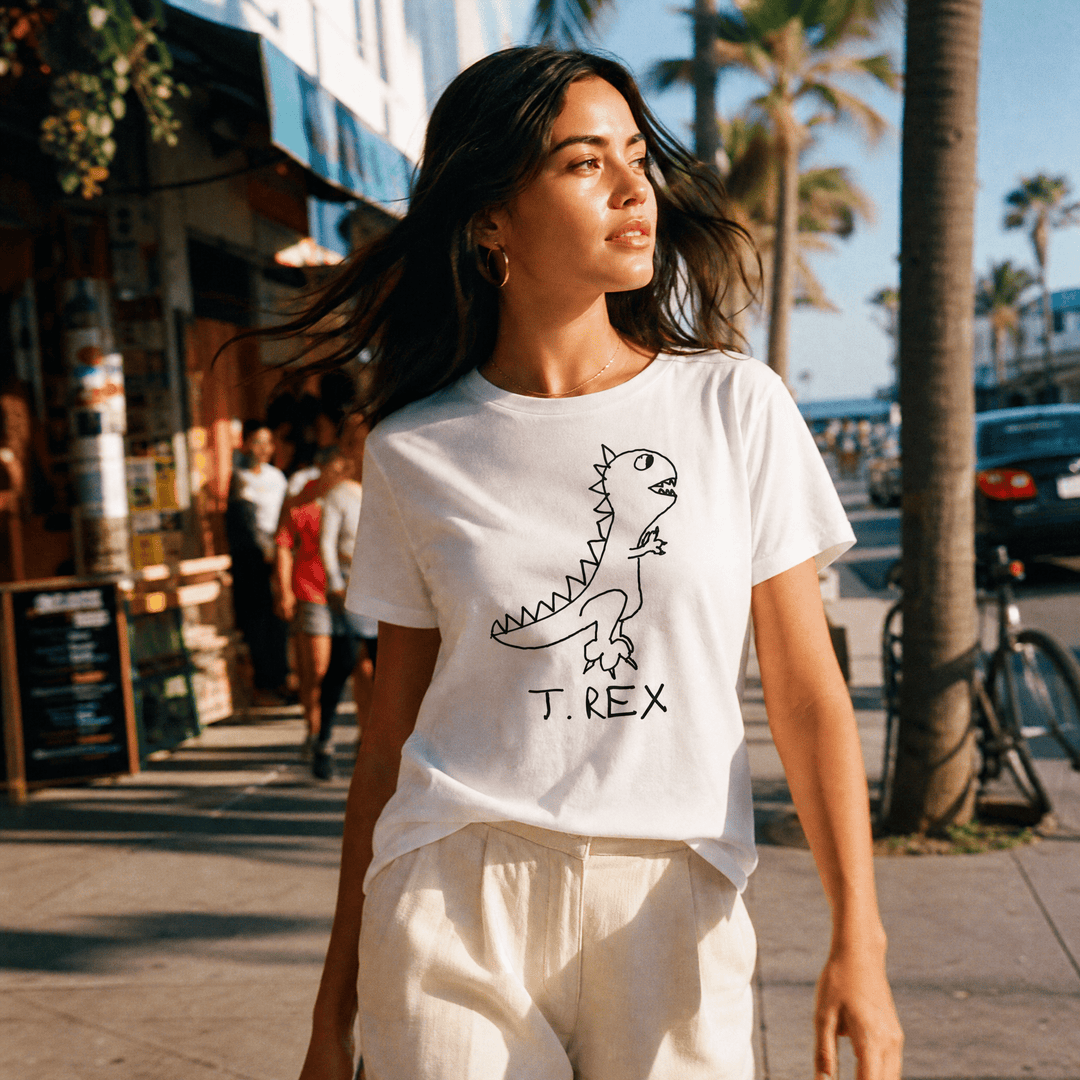 Woman walking a palm-lined beach town street in a lo-fi T. Rex Women&