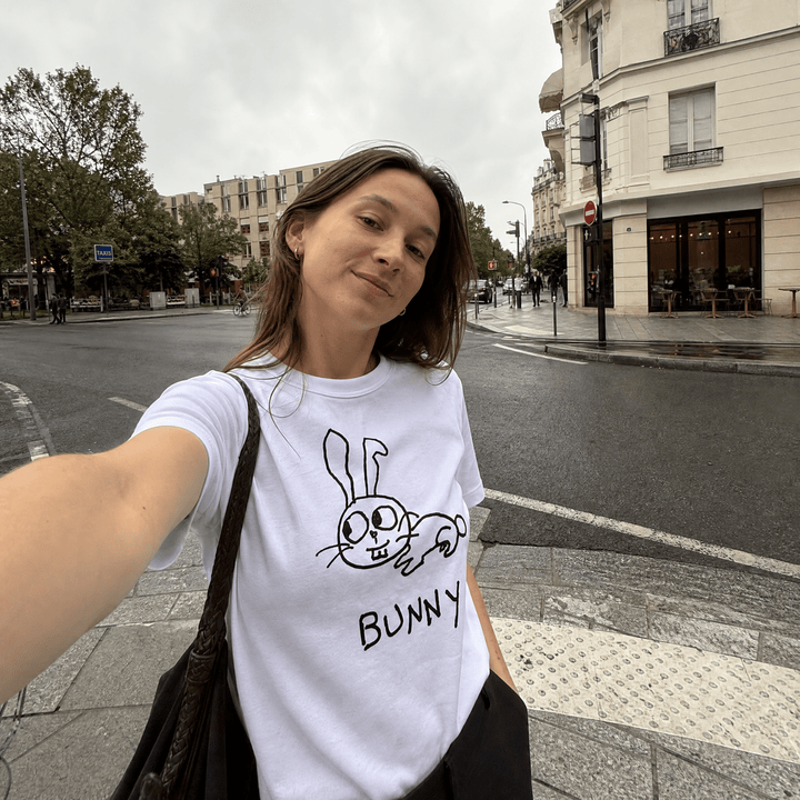 Woman taking a street selfie in a lo-fi Bunny Women&