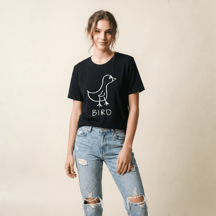 Woman in a studio portrait wearing a lo-fi Bird Women&