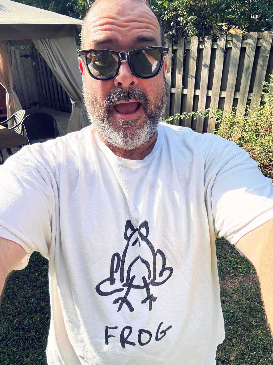 Man taking selfie wearing frog graphic tee - lofi animal shirt streetwear minimalist style