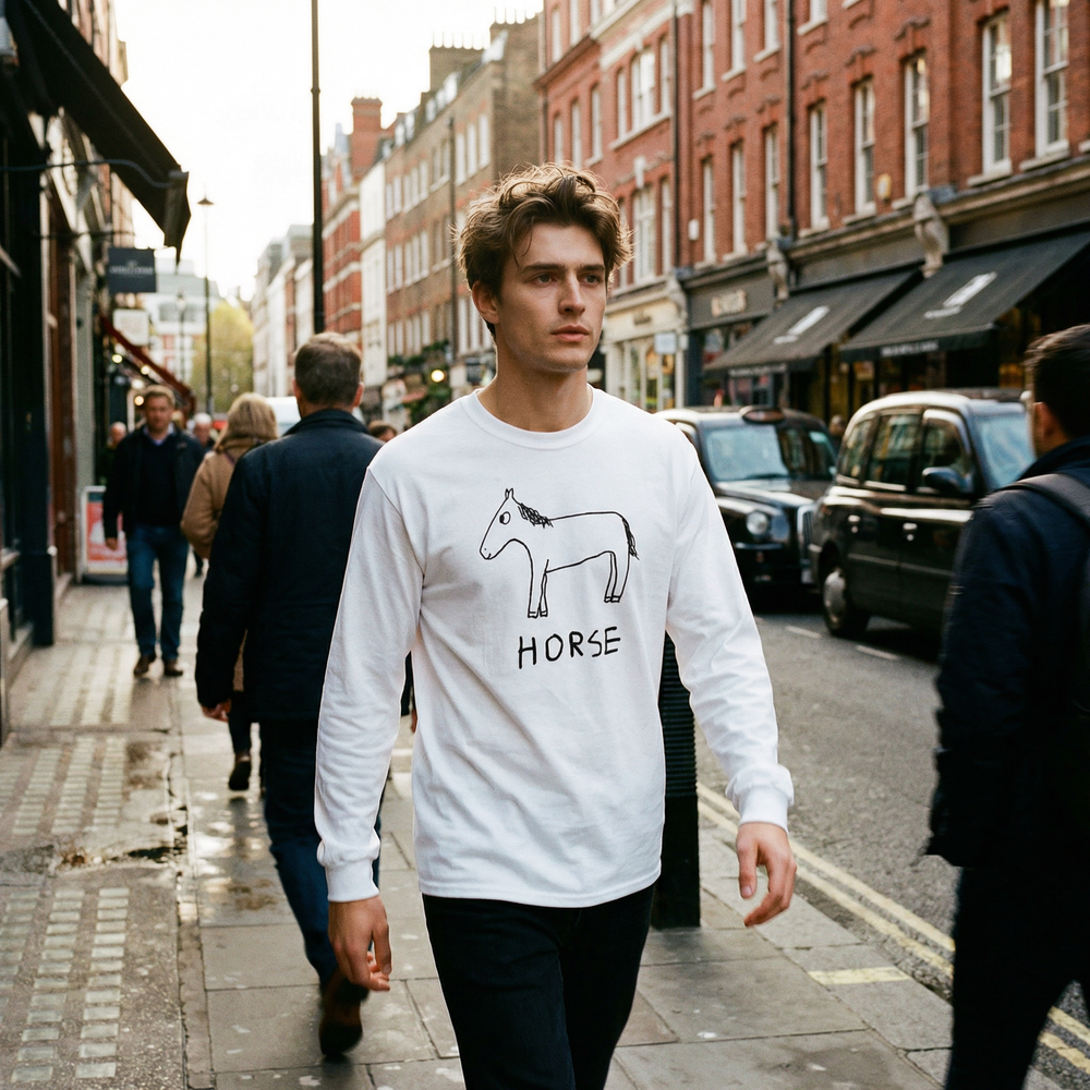 Person in a horse graphic long sleeve crossing a London street in Soho