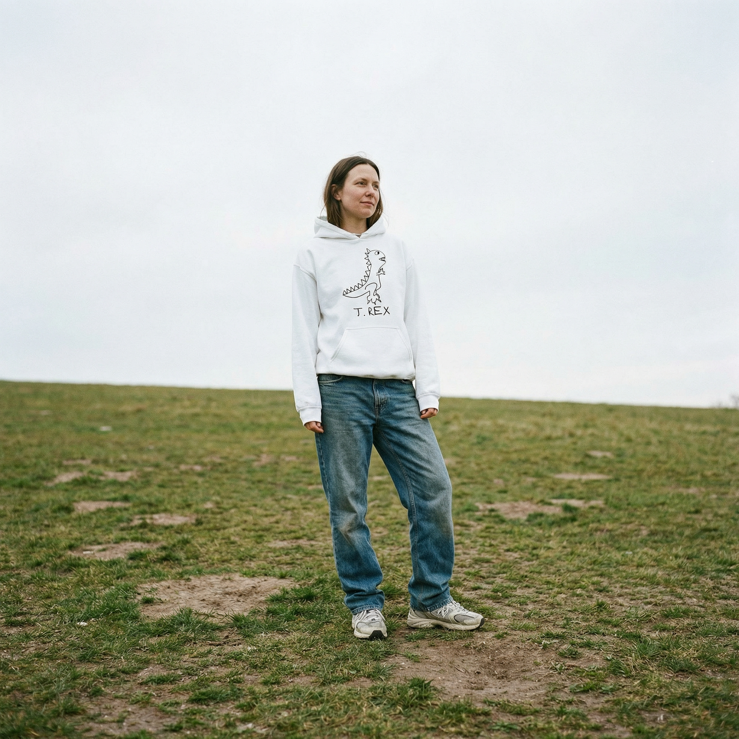 T-Rex hoodie worn outdoors – minimalist lofi T-Rex hoodie in natural setting