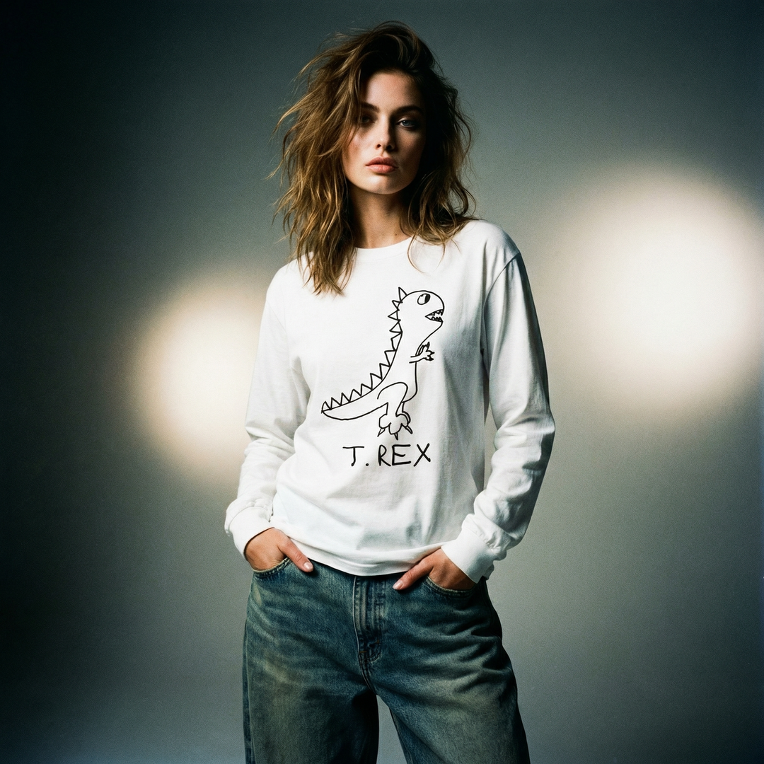 Model wearing a T-Rex graphic long sleeve in a bold, high-energy 90s photo shoot