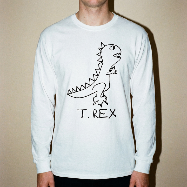 Model in a T-Rex long sleeve tee posed confidently against a clean dark backdrop