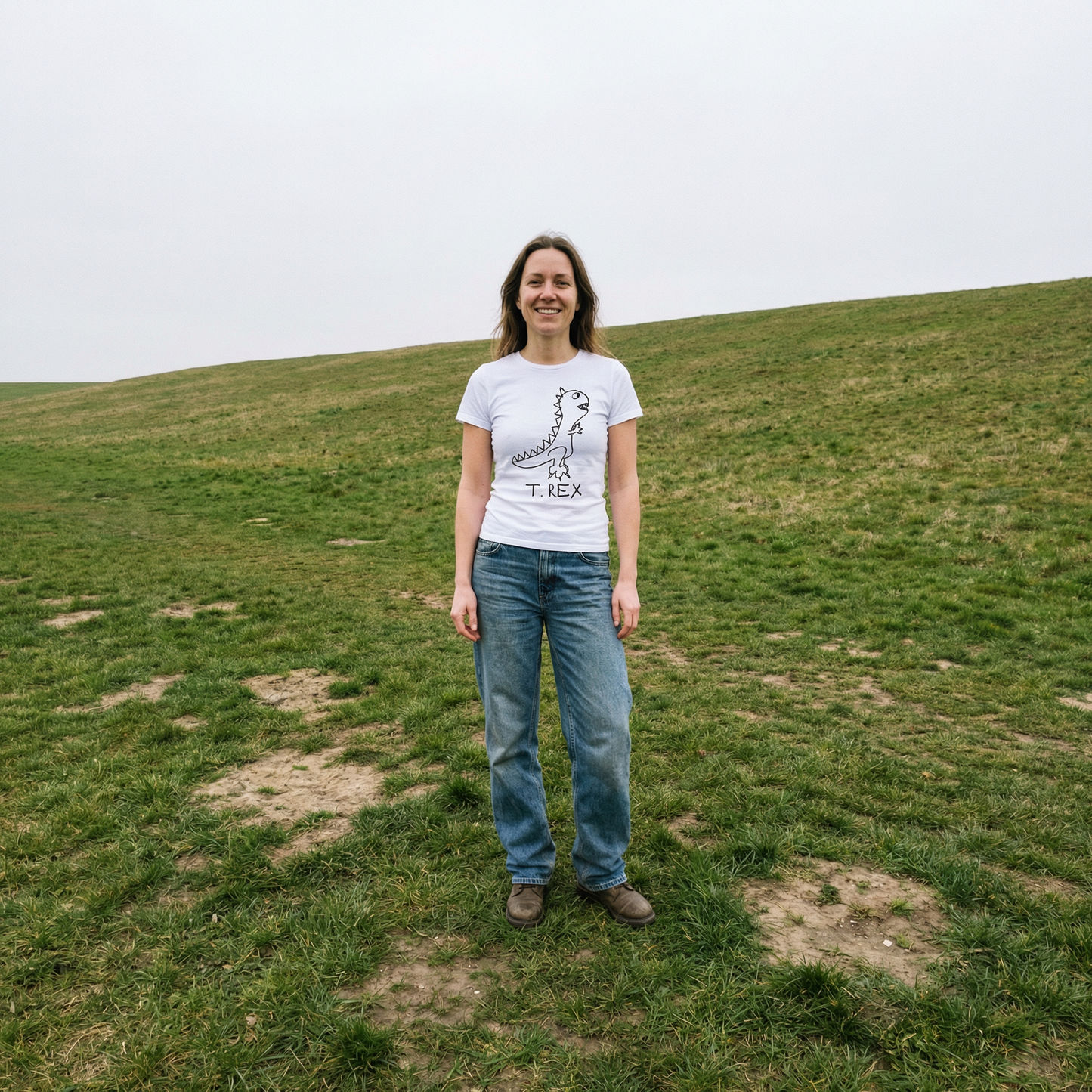 T-Rex women's tee worn outdoors – minimalist lofi T-Rex shirt in grassy field
