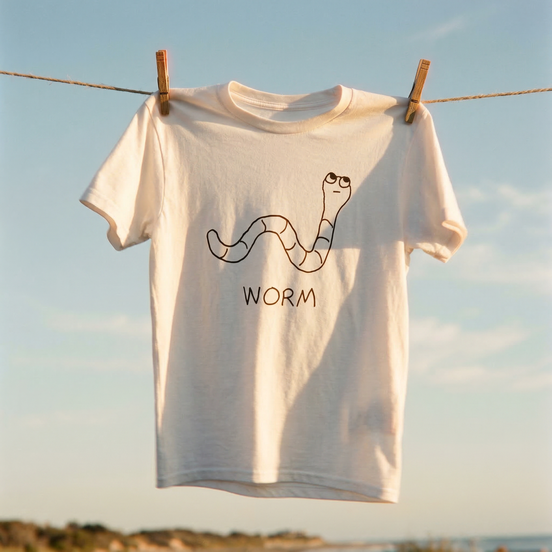 White t-shirt with a worm graphic and &