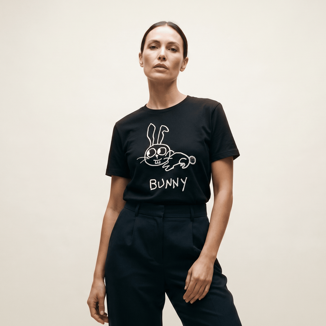 Woman in a minimalist studio portrait wearing a lo-fi Bunny Women&