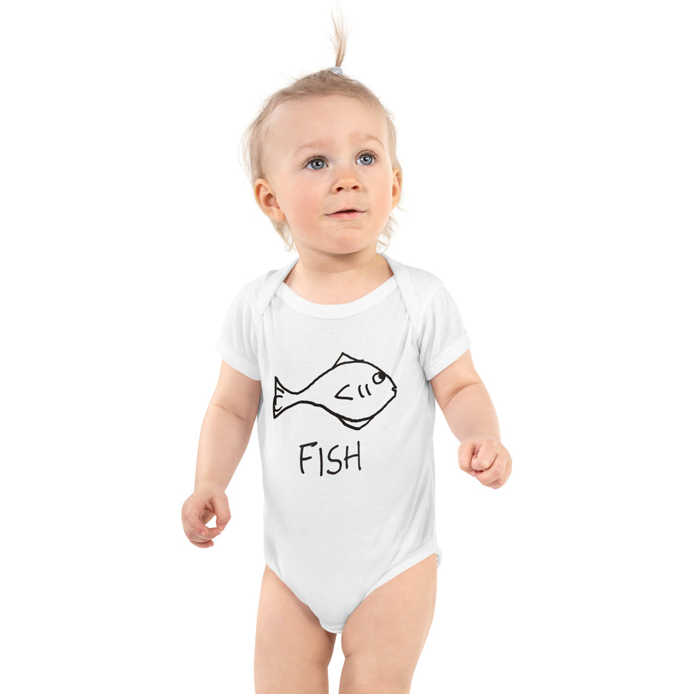 Cute baby wearing a white infant bodysuit with a hand drawn fish and the word "FISH" on the front. 