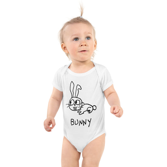 cute baby wearing a white infant body suit with a hand drawn bunny and the word "BUNNY"