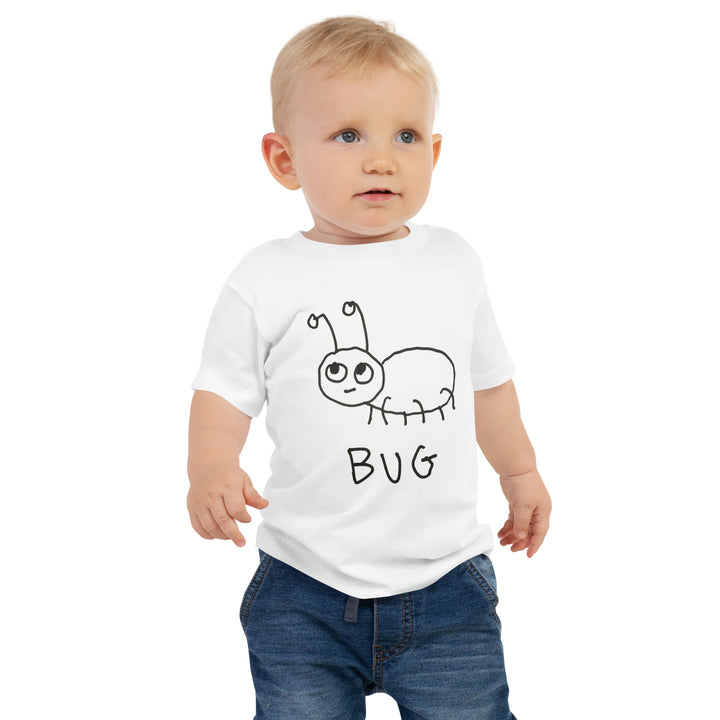 Cute Baby wearing a white t-shirt with simple hand drawn bug graphic and "BUG" text, standing in front of white background