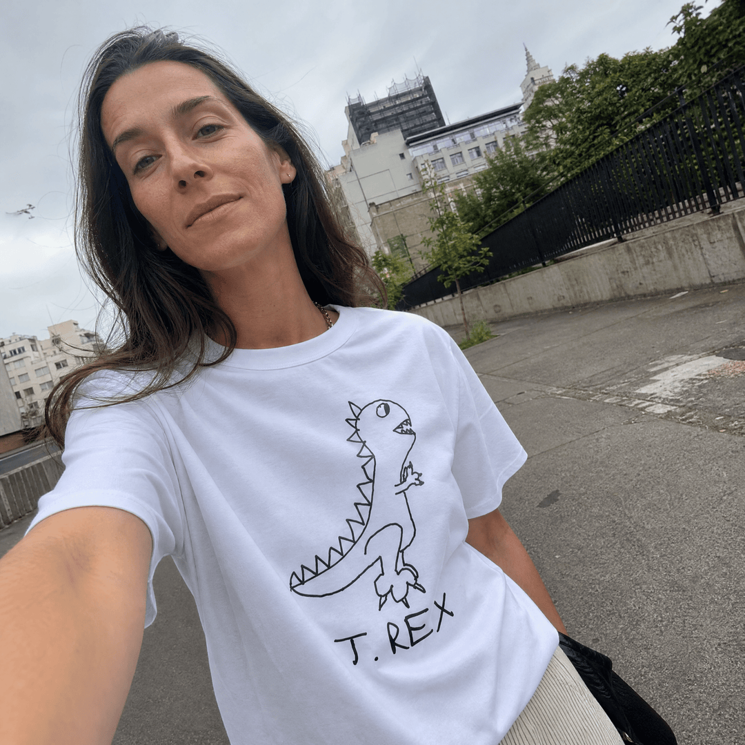Woman taking a street selfie in a lo-fi T. Rex Women&