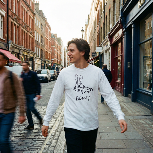 Person in a bunny graphic long sleeve darting through a lively Soho street, London