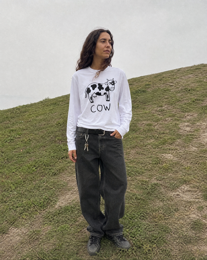 lo-fi Cow Long Sleeve Tee — hand-drawn cow graphic on a white long-sleeve t-shirt