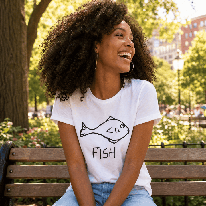 Woman seated on a bench in a lo-fi Fish Women&