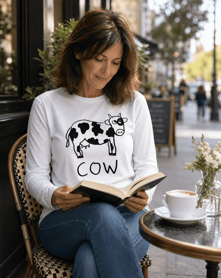lo-fi Cow Long Sleeve Tee — hand-drawn cow graphic on a white long-sleeve t-shirt