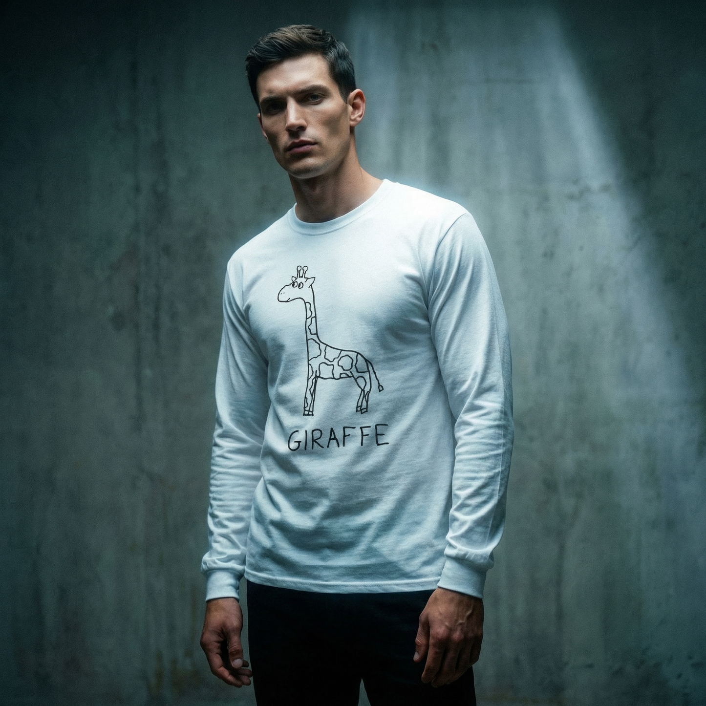 Man wearing a white long-sleeve tee shirt with a hand drawn giraffe design against a gray background