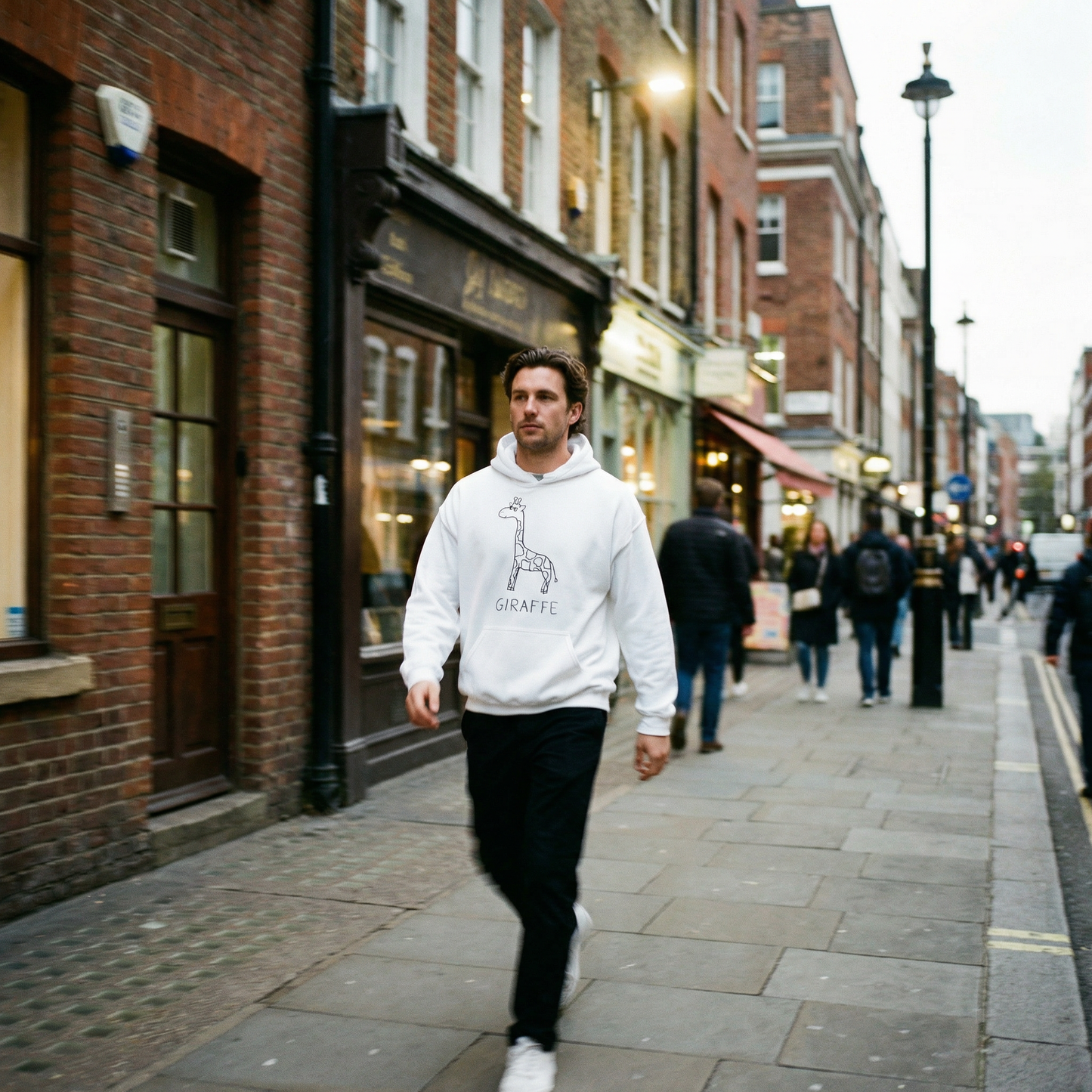 Giraffe graphic hoodie worn on city street – lofi animal streetwear