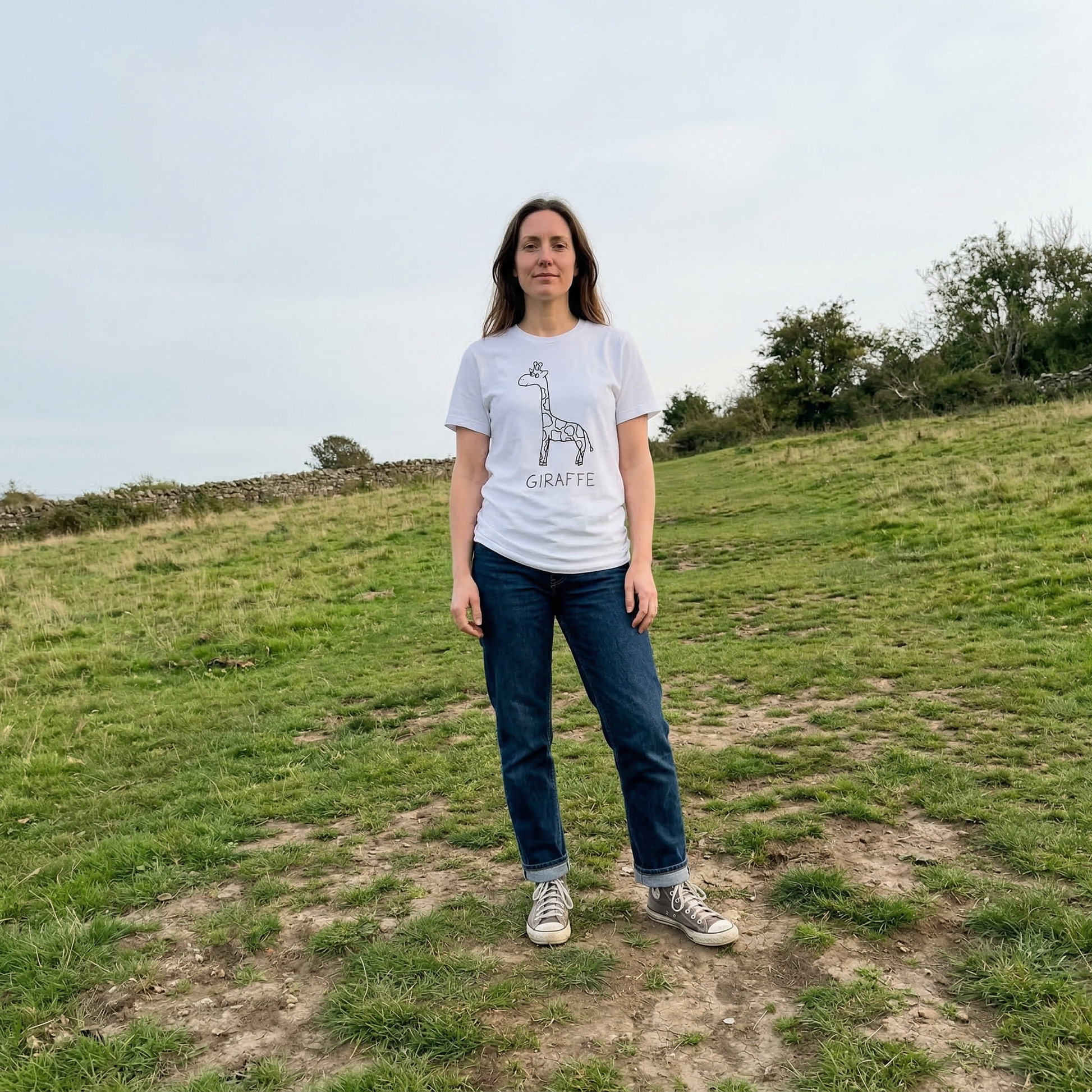 Giraffe shirt worn outdoors – minimalist lofi giraffe tee in natural setting