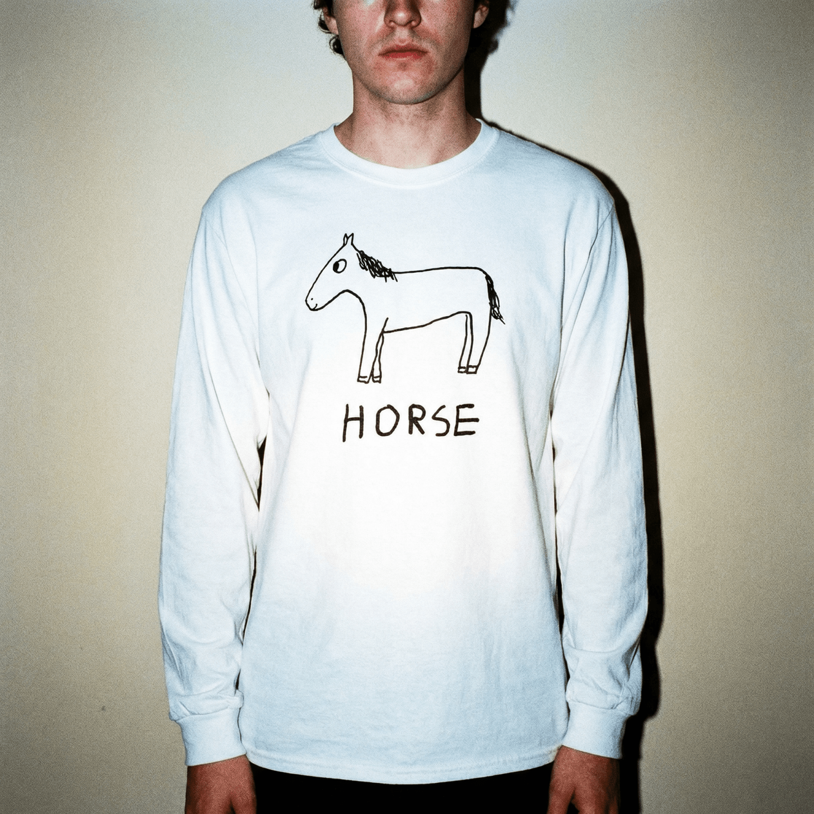 lo-fi Horse Long Sleeve Tee — hand-drawn horse graphic on a white long-sleeve t-shirt