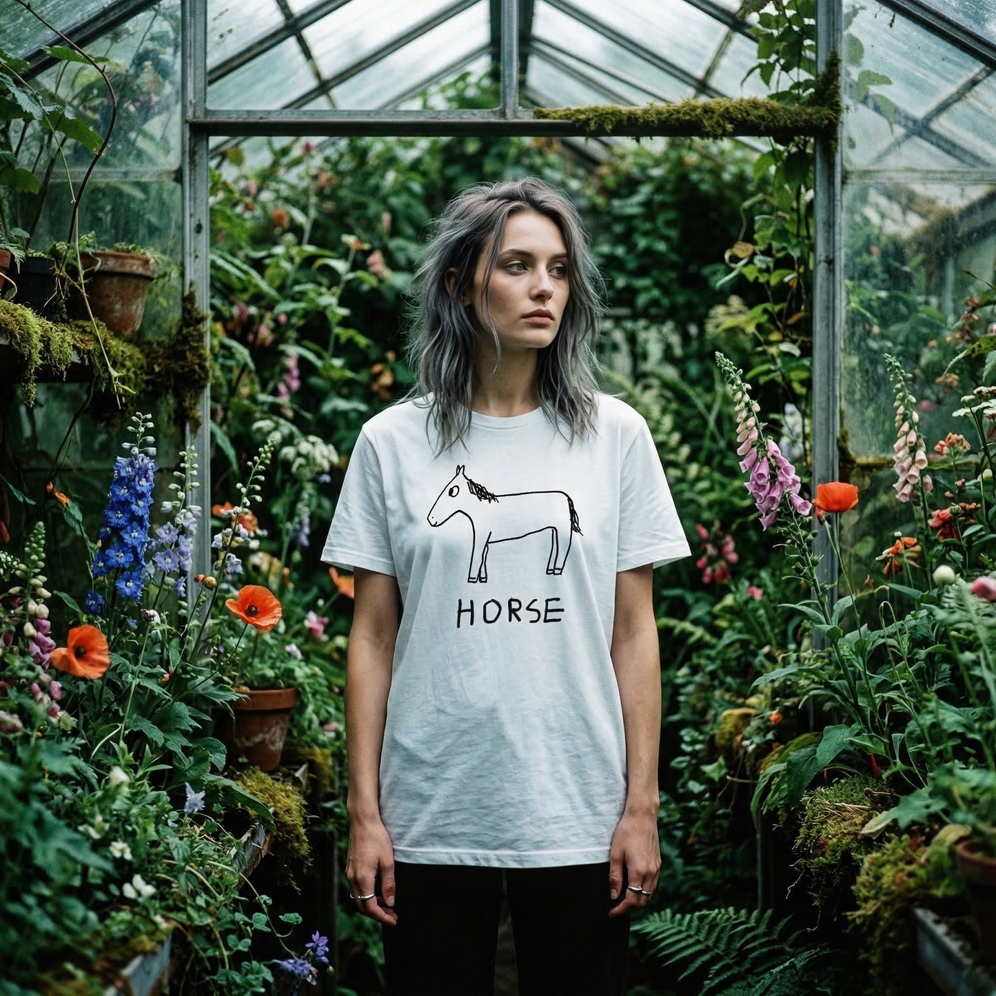 Horse classic tee worn by goth woman in greenhouse setting – quirky animal graphic tee