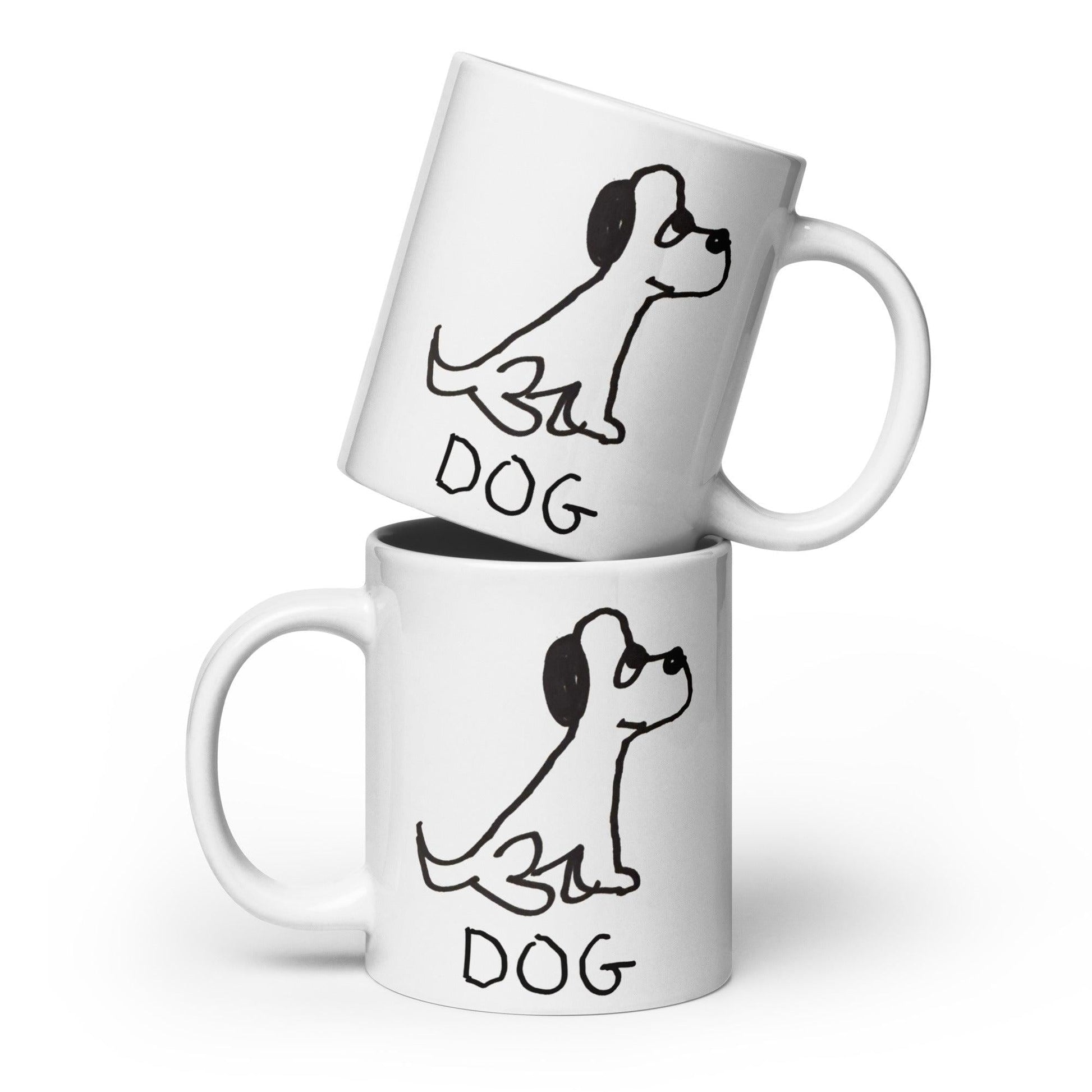 two white coffee mugs stacked both  featuring a crude marker black and white marker drawing of a cute dog with the word "DOG" handwritten underneath