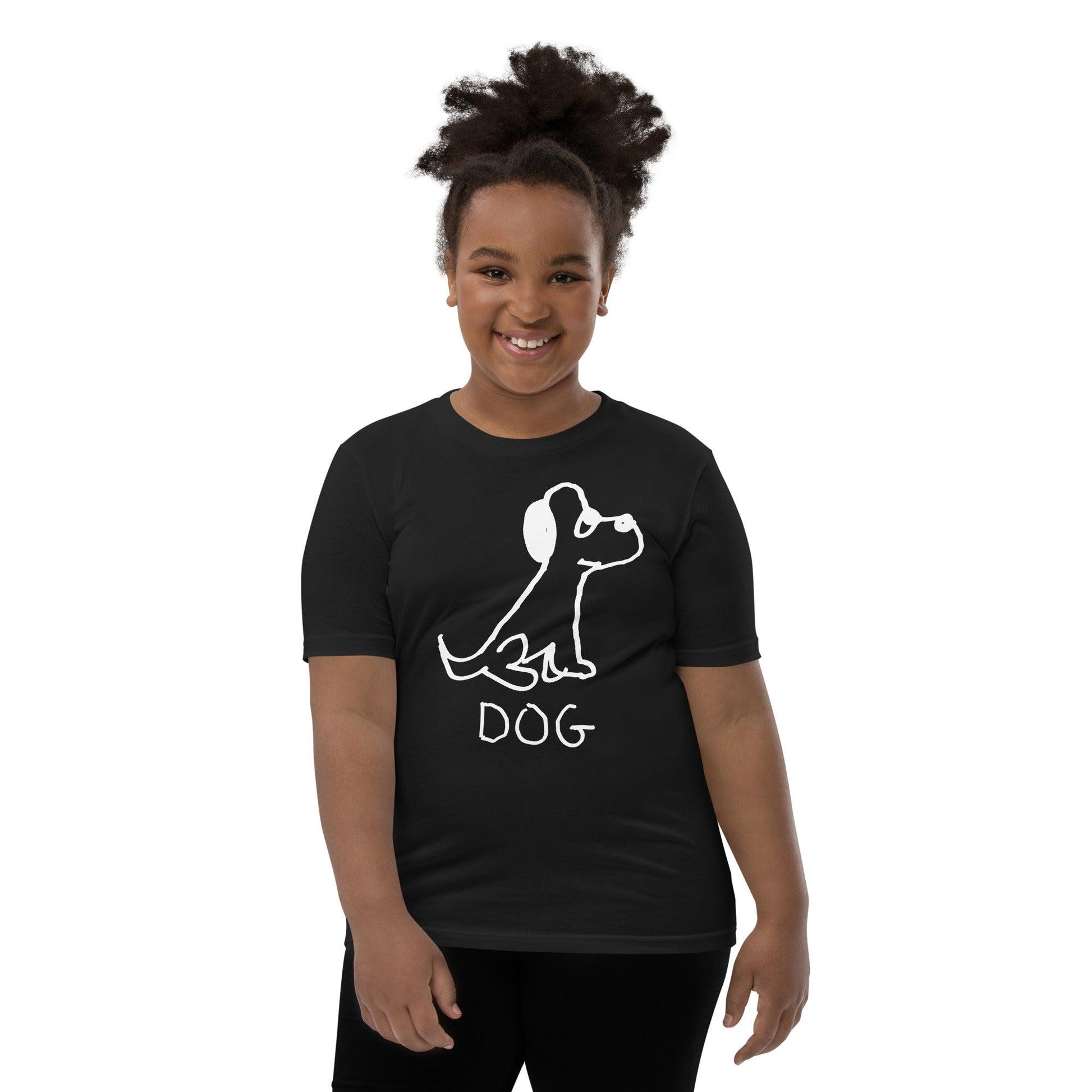young girl wearing a black t-shirt featuring a crude marker black and white marker drawing of a cute dog with the word "DOG" handwritten underneath