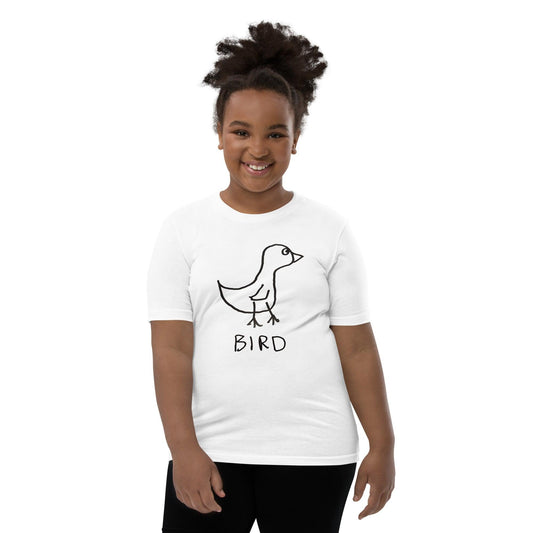 Young girl wearing a t-shirt featuring  a crudely drawn black marker drawing of a bird with the word "Bird" underneath