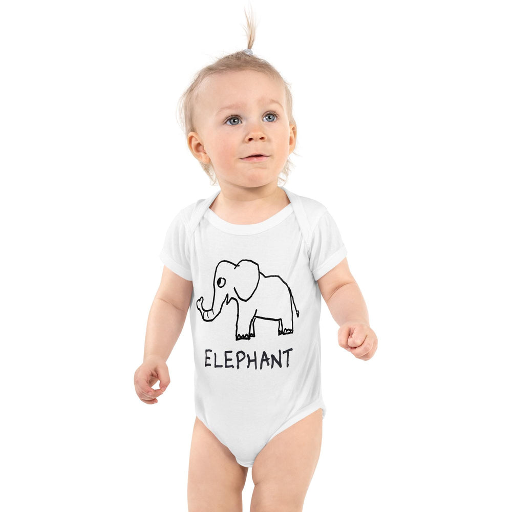Cute baby wearing a white baby onesie with a drawing of an Elephant and the word 'ELEPHANT" on the front.