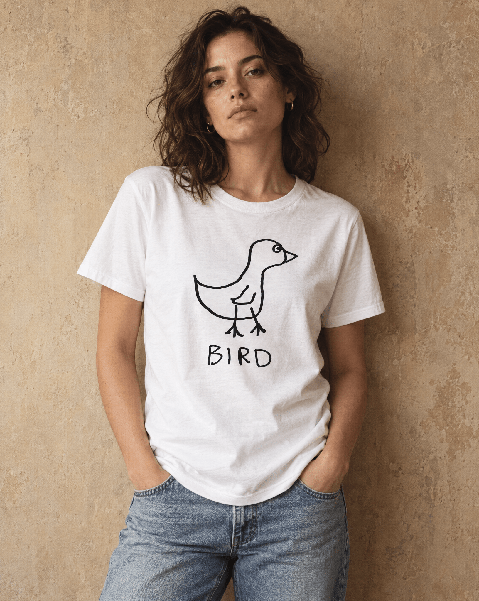 Sep 29 bird women's tee — studio portrait lifestyle photo