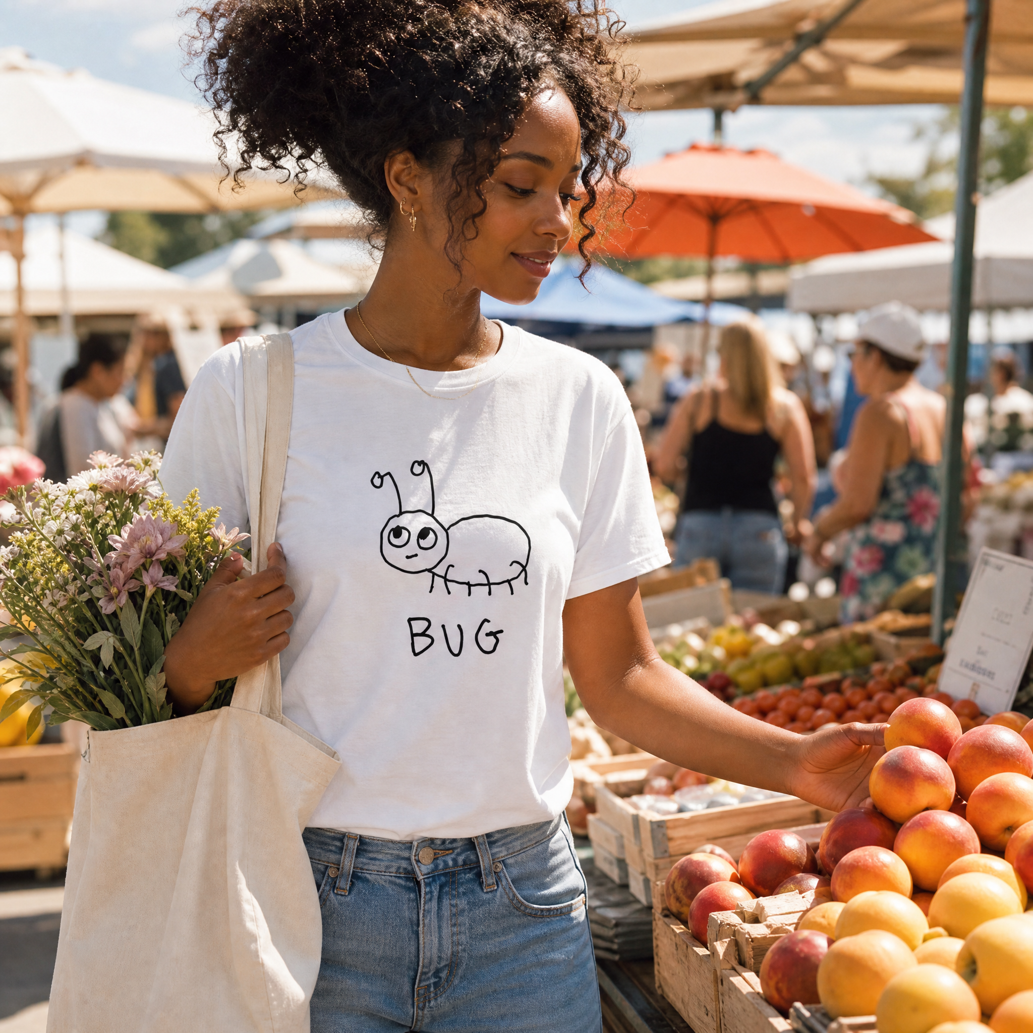 Woman with a tote of flowers at a farmers market wearing a lo-fi Bug Classic Tee