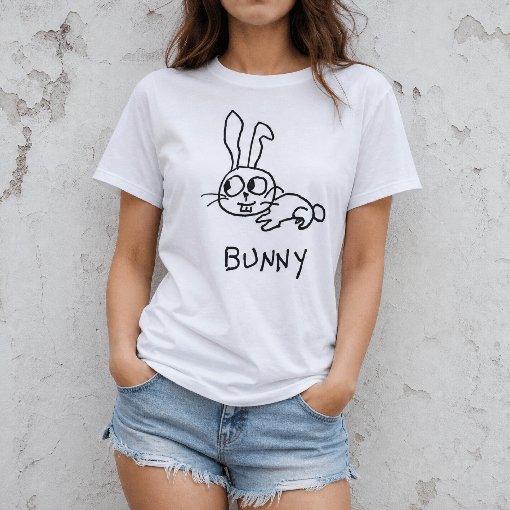 Woman street-style torso shot in a lo-fi Bunny Women's Relaxed T-Shirt in white