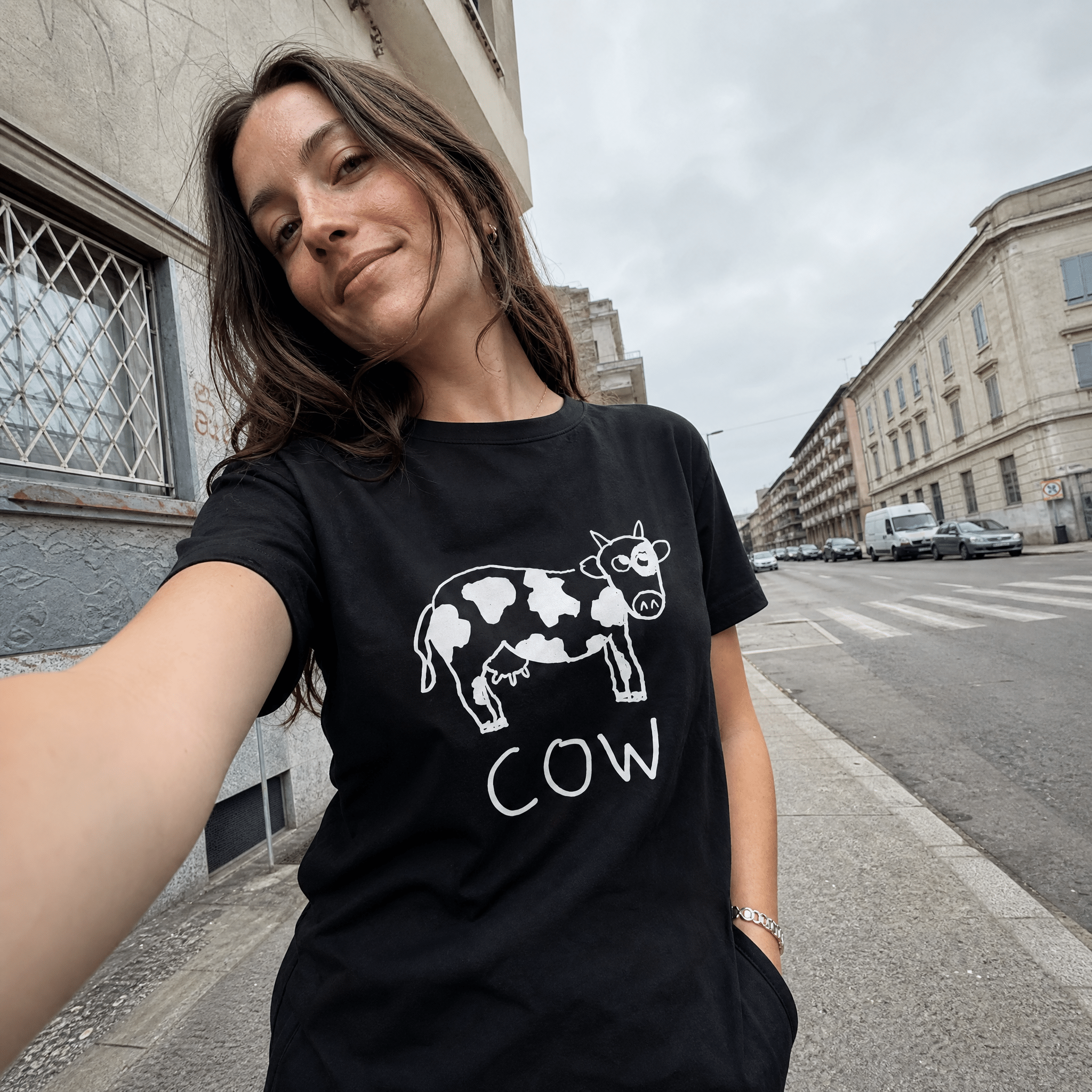 lo-fi Cow Women's Relaxed T-Shirt — hand-drawn cow graphic on a white relaxed-fit tee