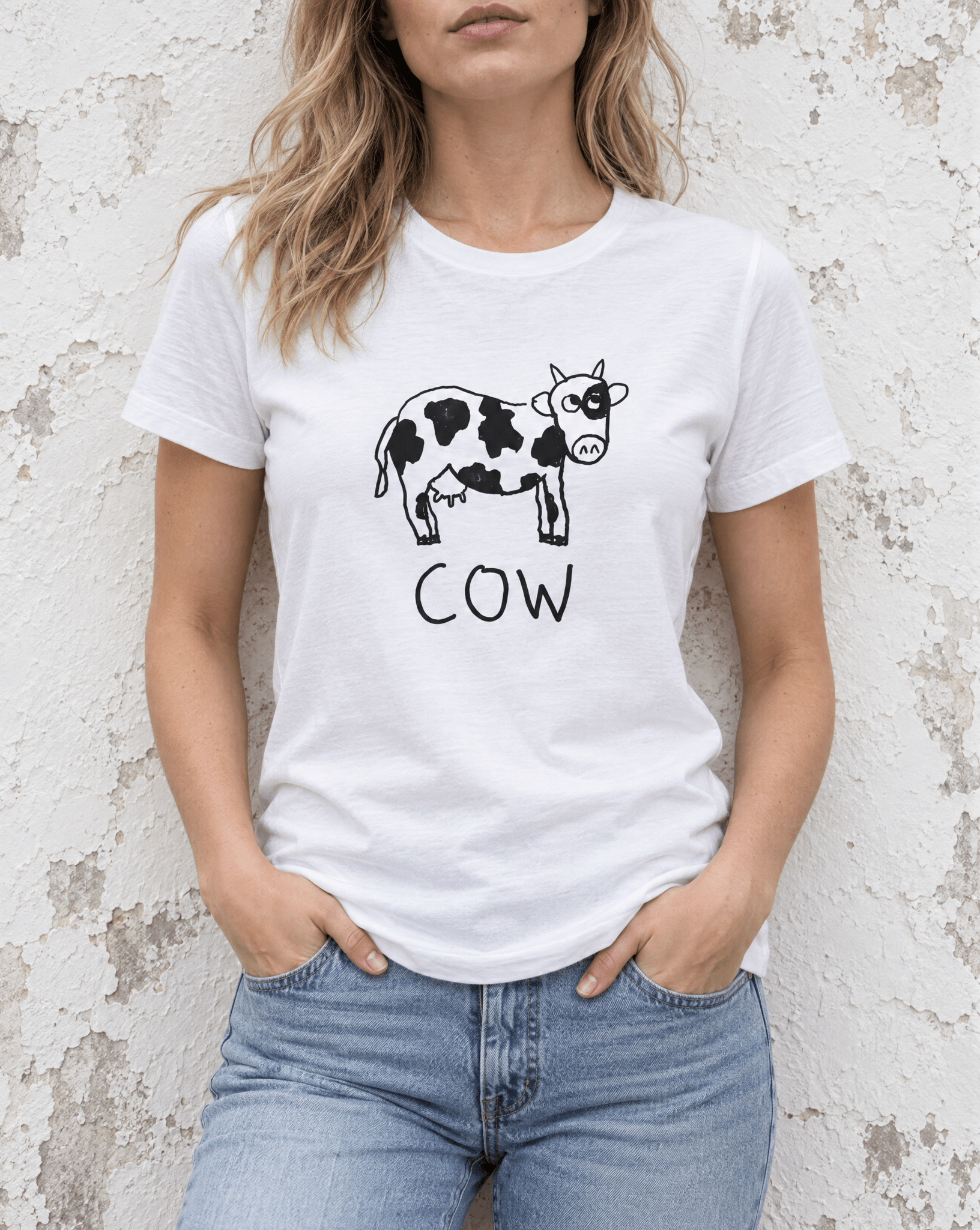 Sep 29 cow women's tee — urban torso lifestyle photo