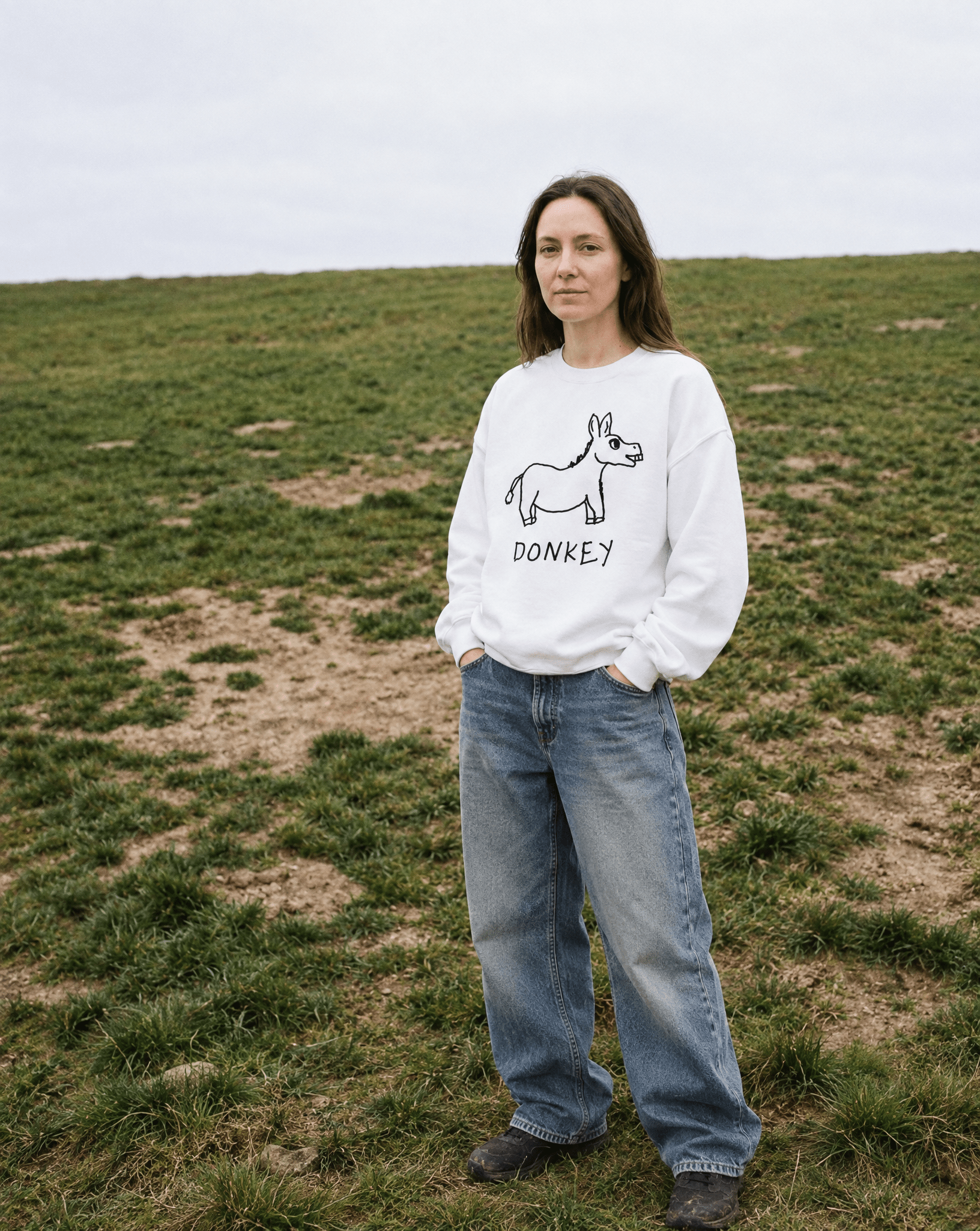 LoFi Donkey Crewneck Sweatshirt lifestyle photo — windswept hill