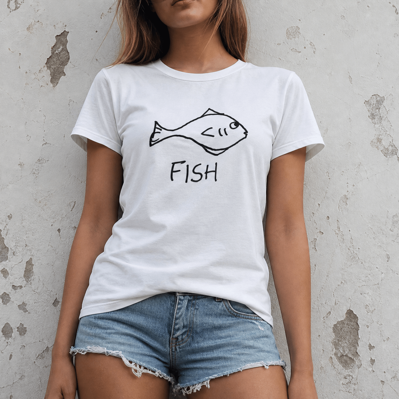 Studio torso view of a woman wearing a lo-fi Fish Women's Relaxed Tee