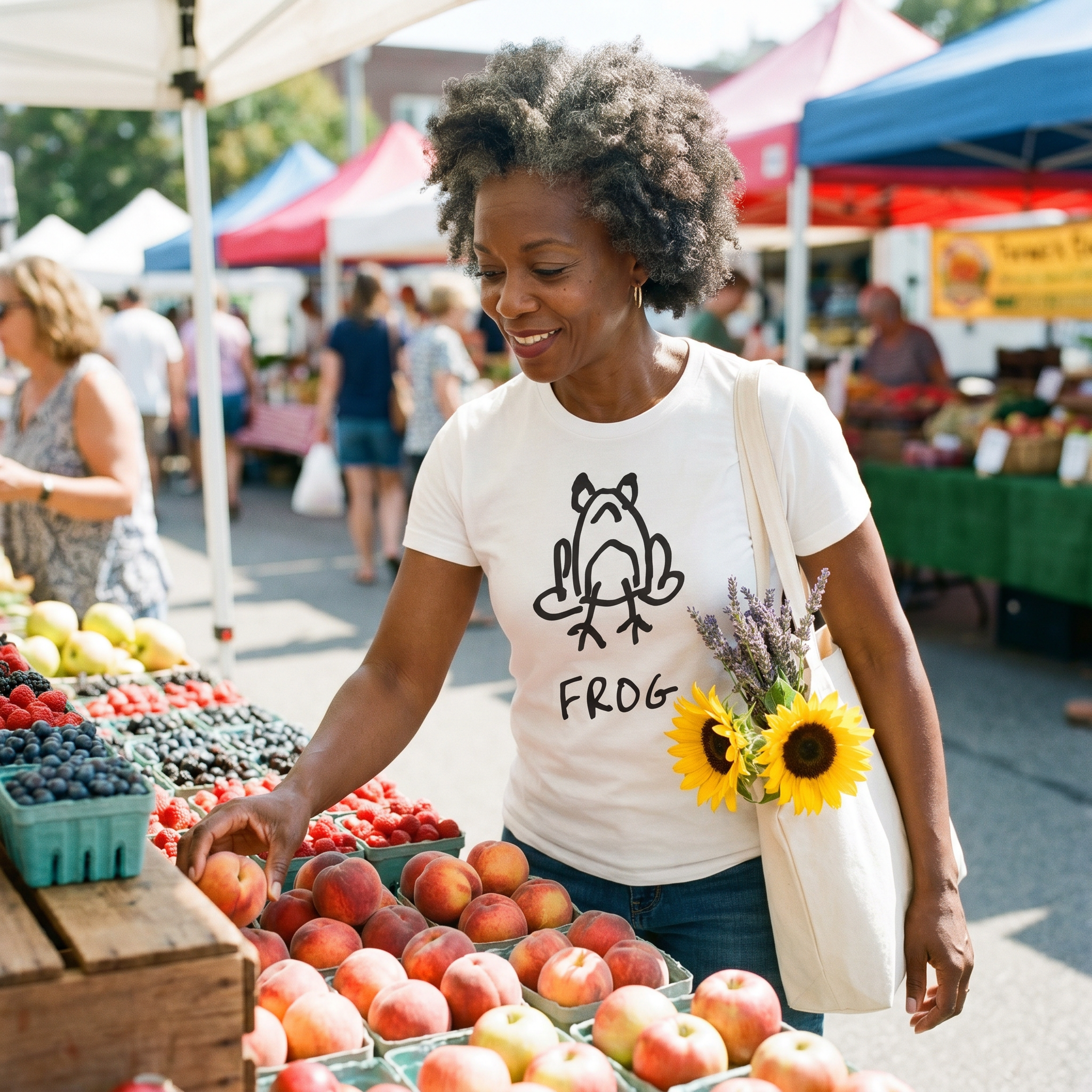 Woman with lavender in her tote at a farmers market wearing a lo-fi Frog Classic Tee