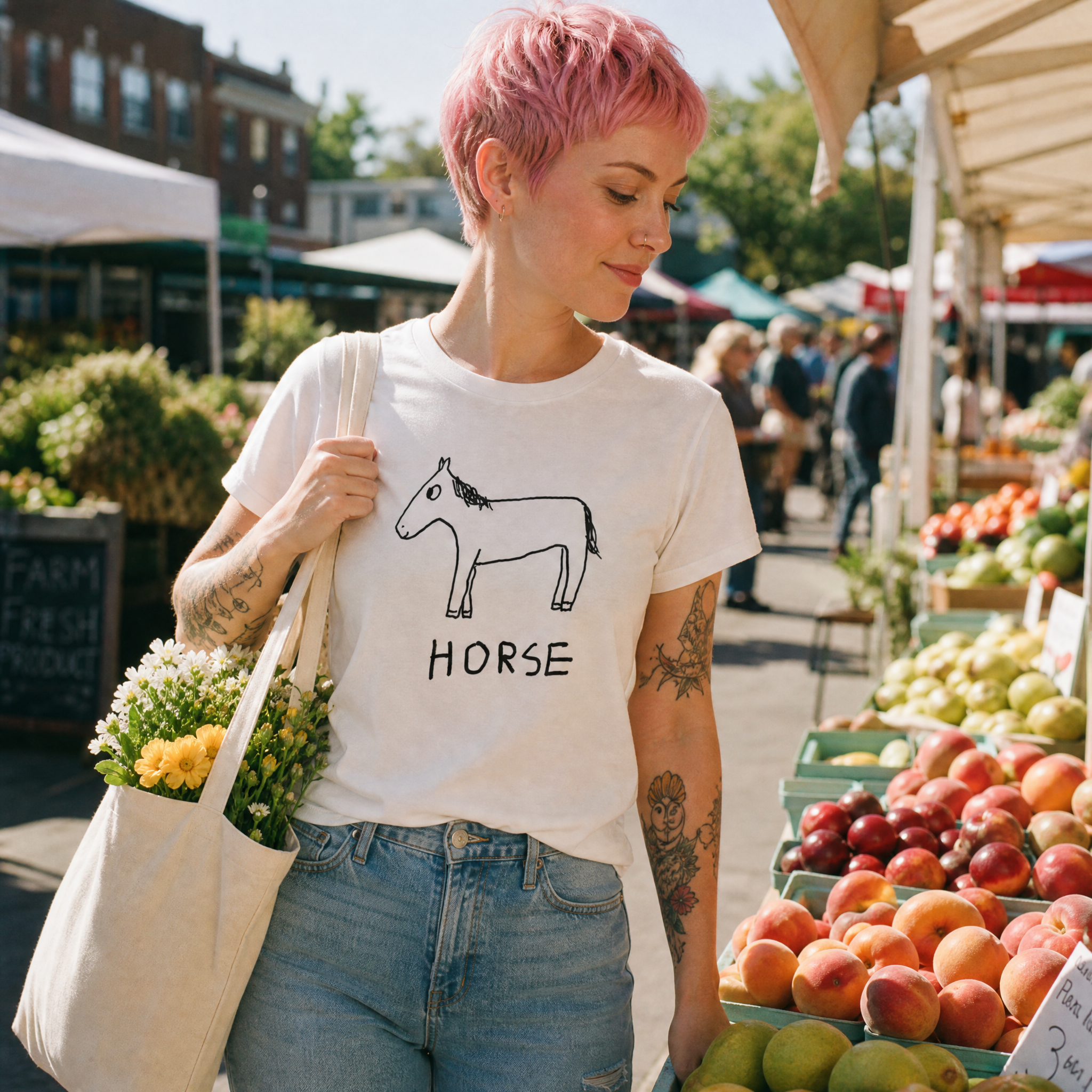 Woman with a pink pixie cut at a farmers market wearing a lo-fi Horse Classic Tee
