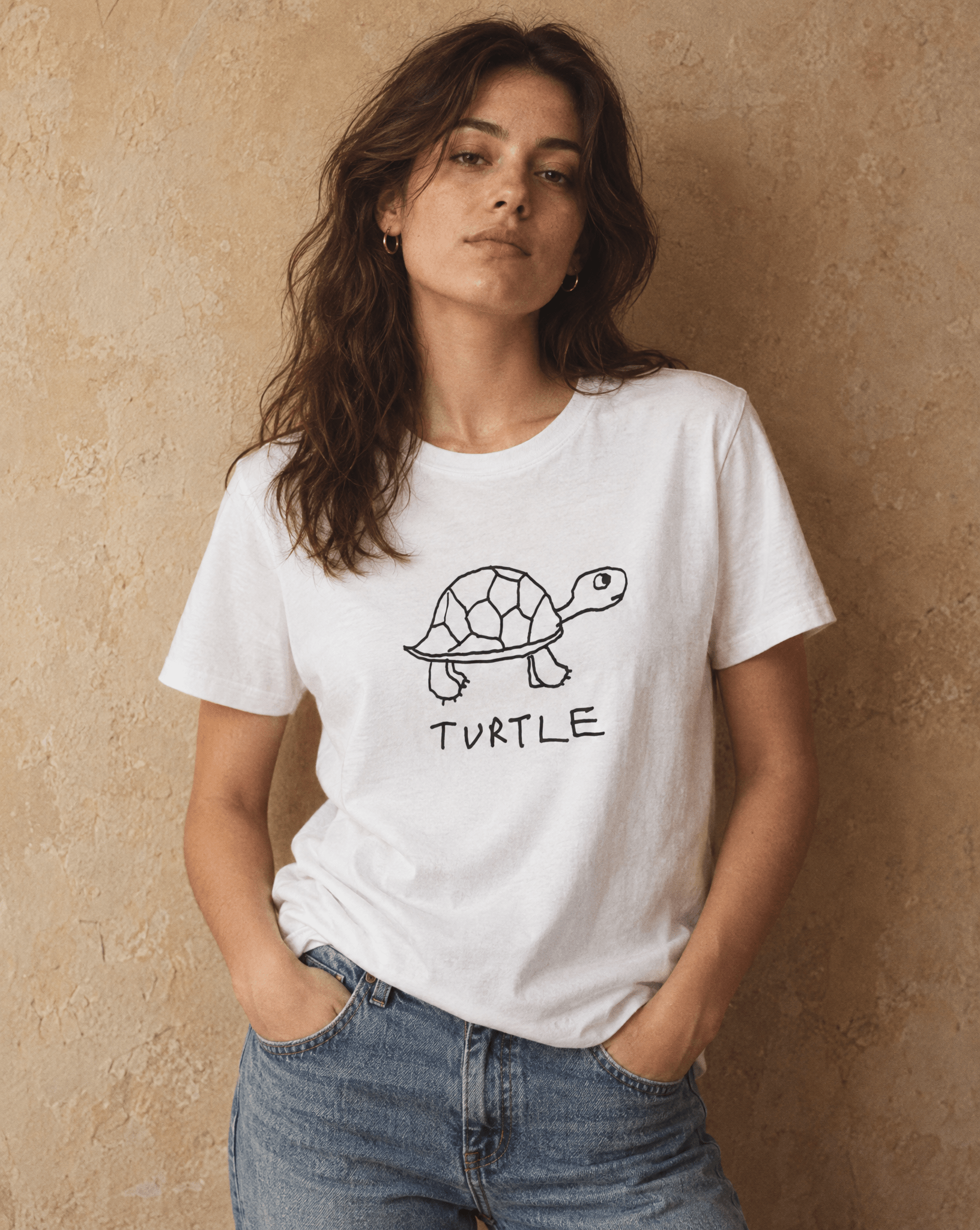 Sep 29 turtle women's tee — studio portrait lifestyle photo