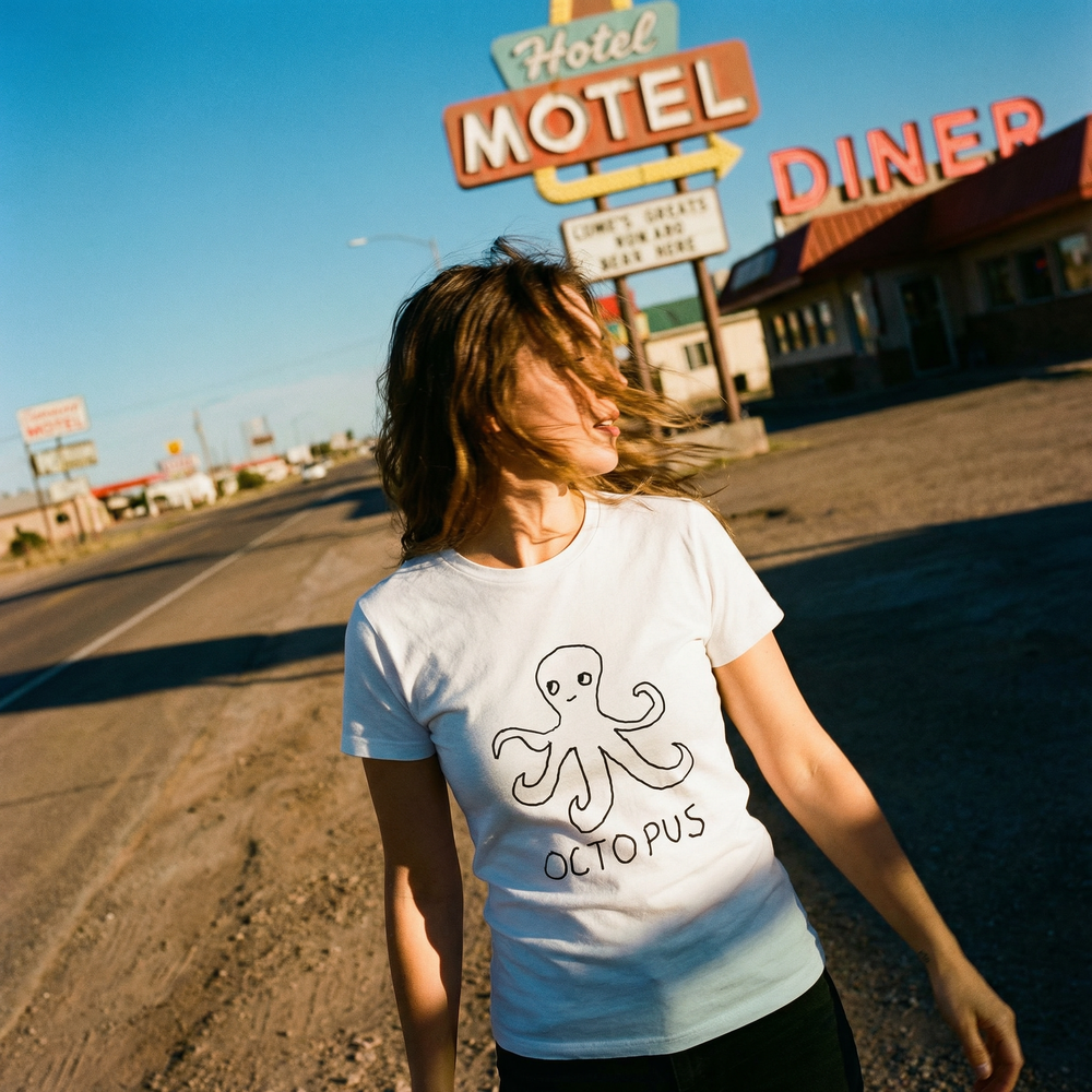 Octopus women's tee in Americana setting – quirky animal graphic tee