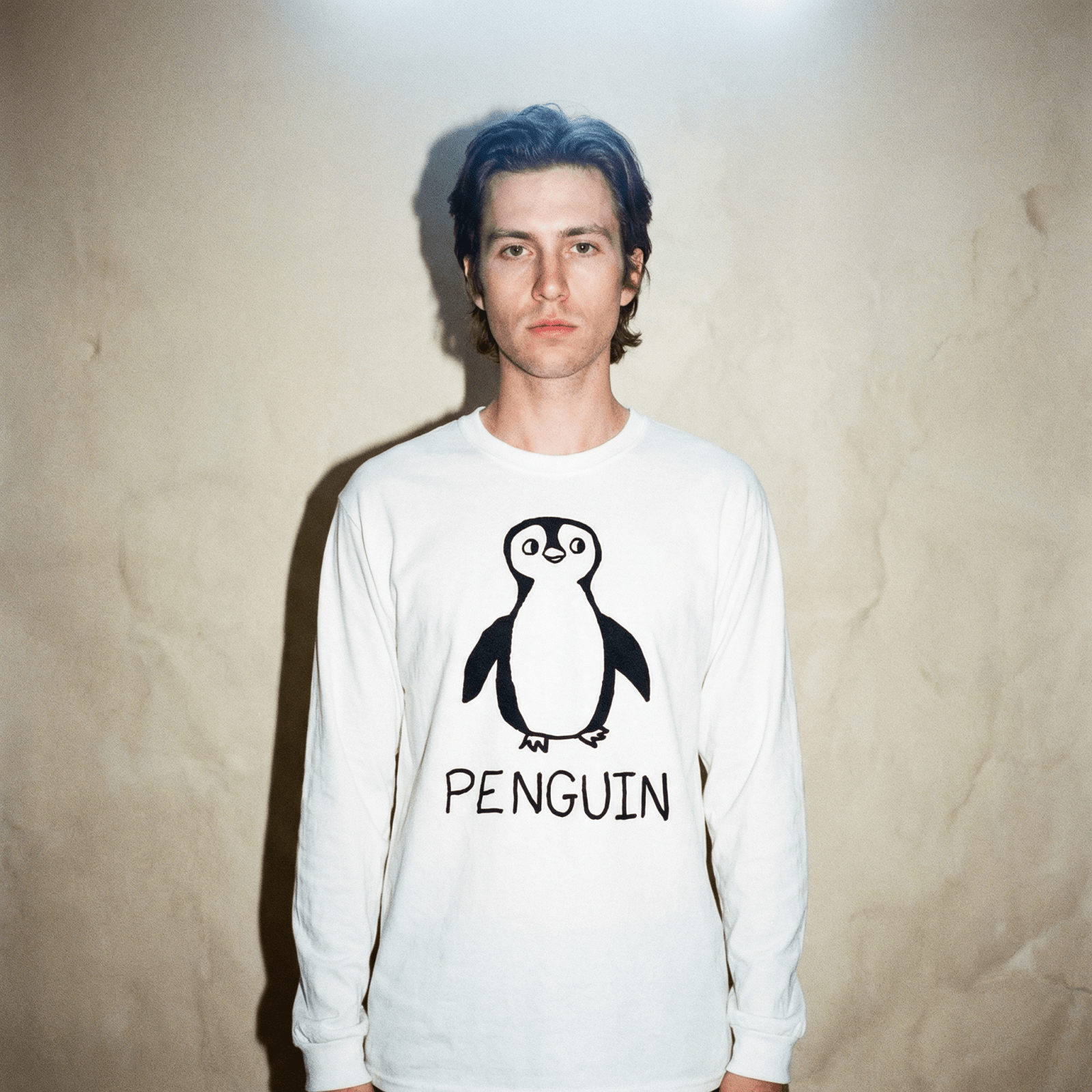 lo-fi Penguin Long Sleeve Tee — hand-drawn penguin graphic on a white long-sleeve t-shirt