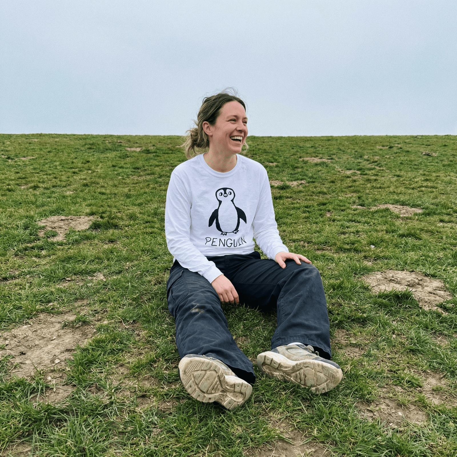 lo-fi Penguin Long Sleeve Tee — hand-drawn penguin graphic on a white long-sleeve t-shirt